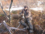 Larry and his Buck dragged down from the top of the Mountain (He hates easy deer)